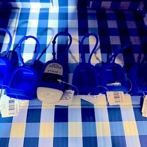Six blue Bath & Body Works Pocketbak Holders